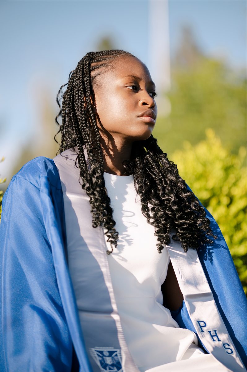 Close portrait in a blue gown, low sun