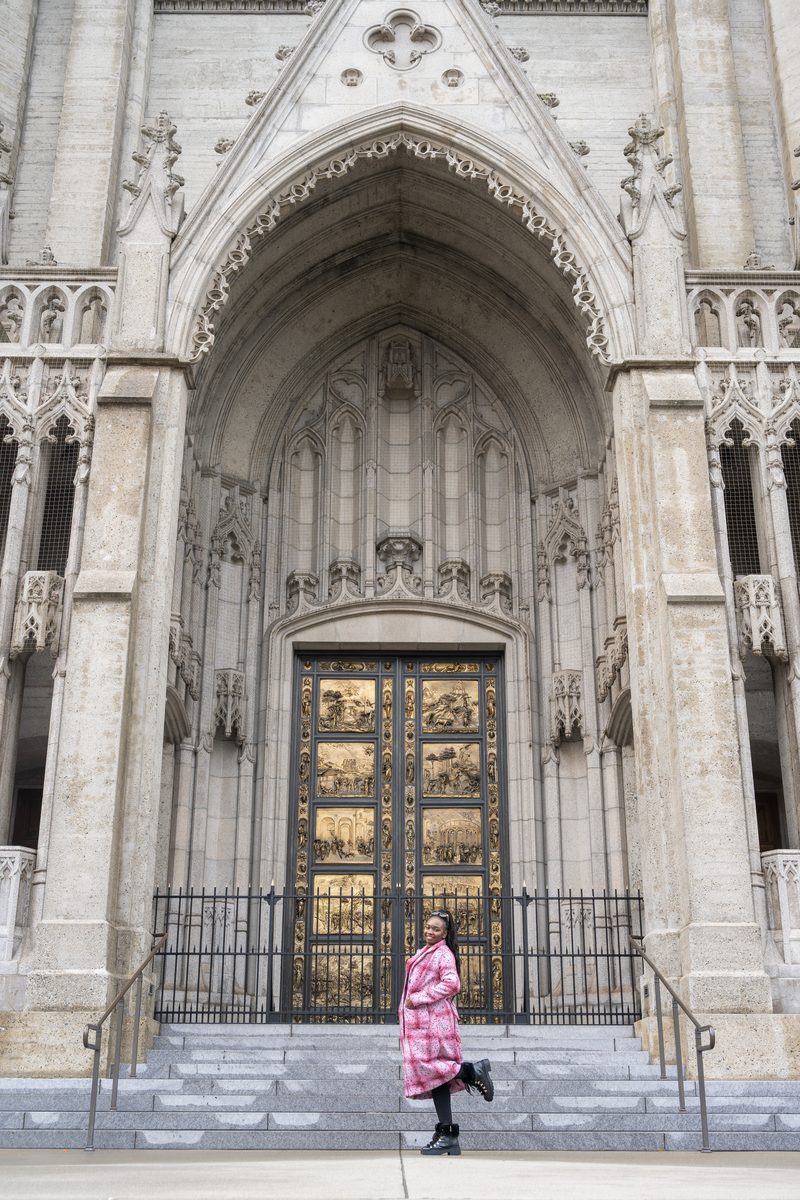 Pink coat on the steps of Grace Cathedral